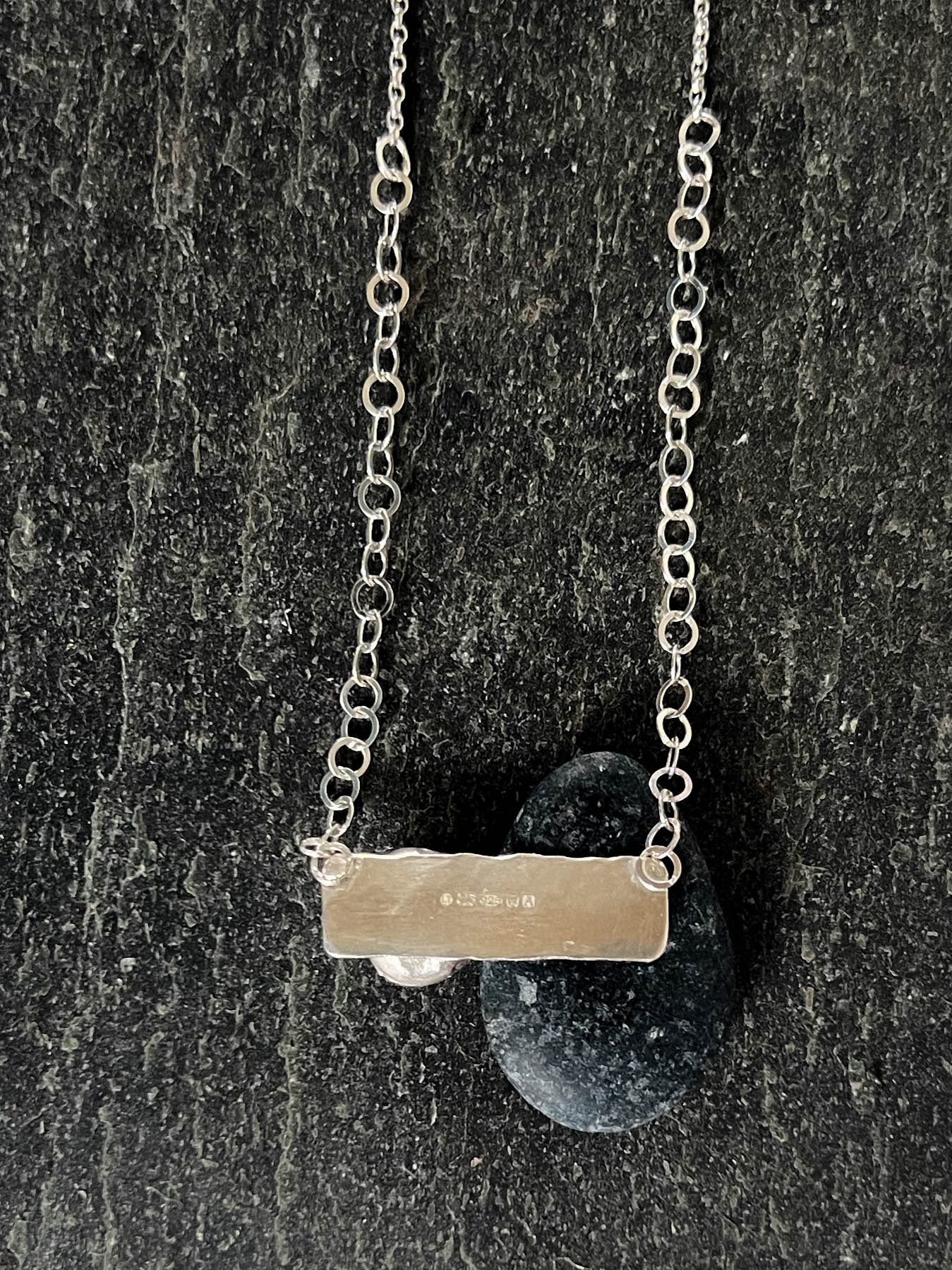 salt cast granite necklace back